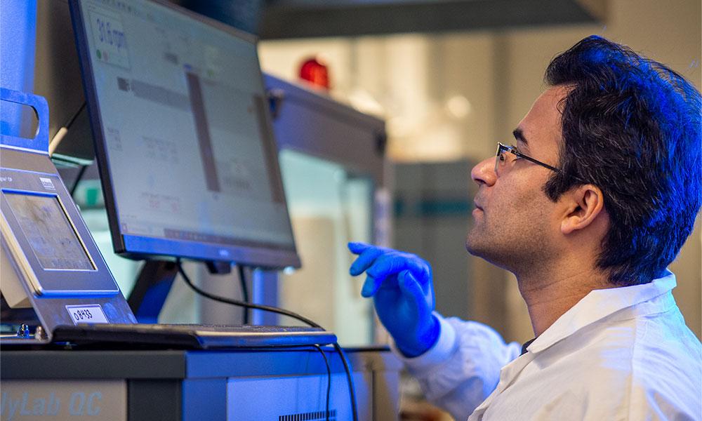 UBCO researcher entering data.