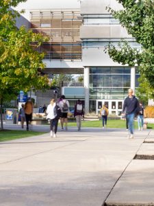 Students, staff and faculty walking on the UBC Okanagan campus.