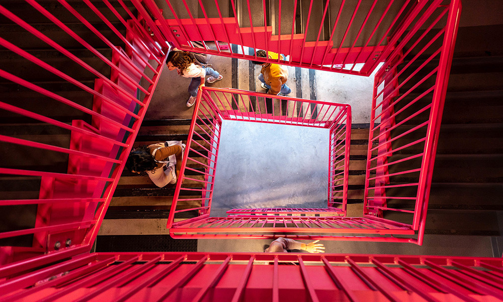 A photo of UBCO employees walking a set of stairs